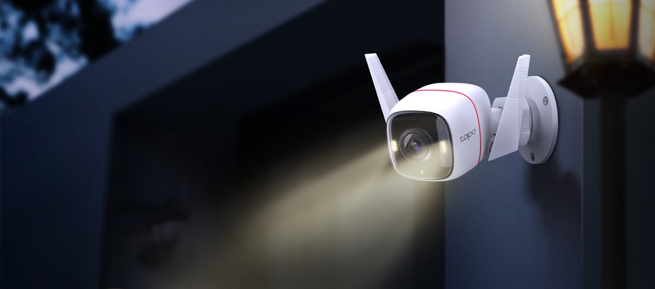 A Tapo C320WS Outdoor Security Wi-Fi Camera is emitting light